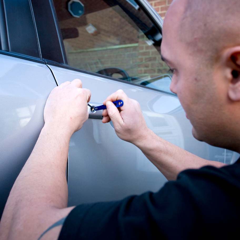 Licensed professional providing emergency locksmith services on a car in Perth, Western  Australia